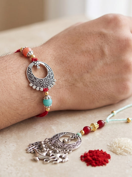Set of 2 Bhaiya Bhabhi Rakhi Set with Maroon Beads, Silver Charms, Roli Chawal & Card (109-CHCR1-1968-2-2026)