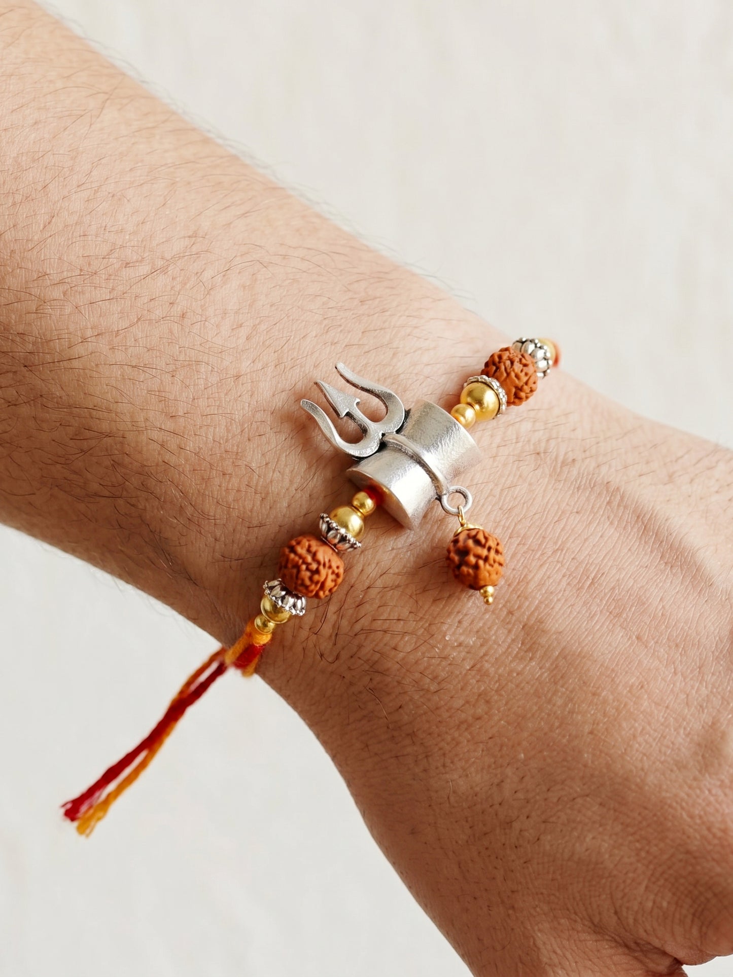 Oxidised Silver Shiva Trishul Rakhi for Bhai with Golden Beads, Roli, Chawal & Card (78-JPR1-1972-S-1-2026)