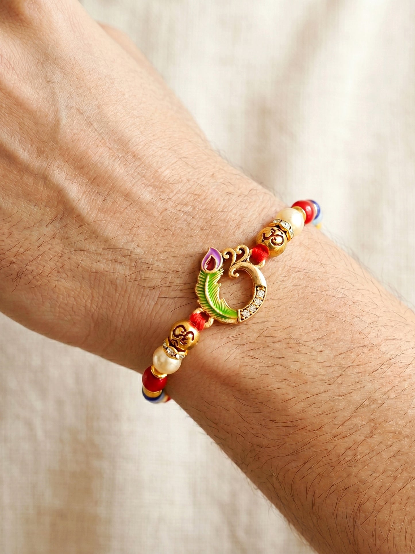 Traditional Om & Peacock Spiritual Beaded Rakhi For Brother With Roli Chawal & Card (72-S5R1-AR2903)
