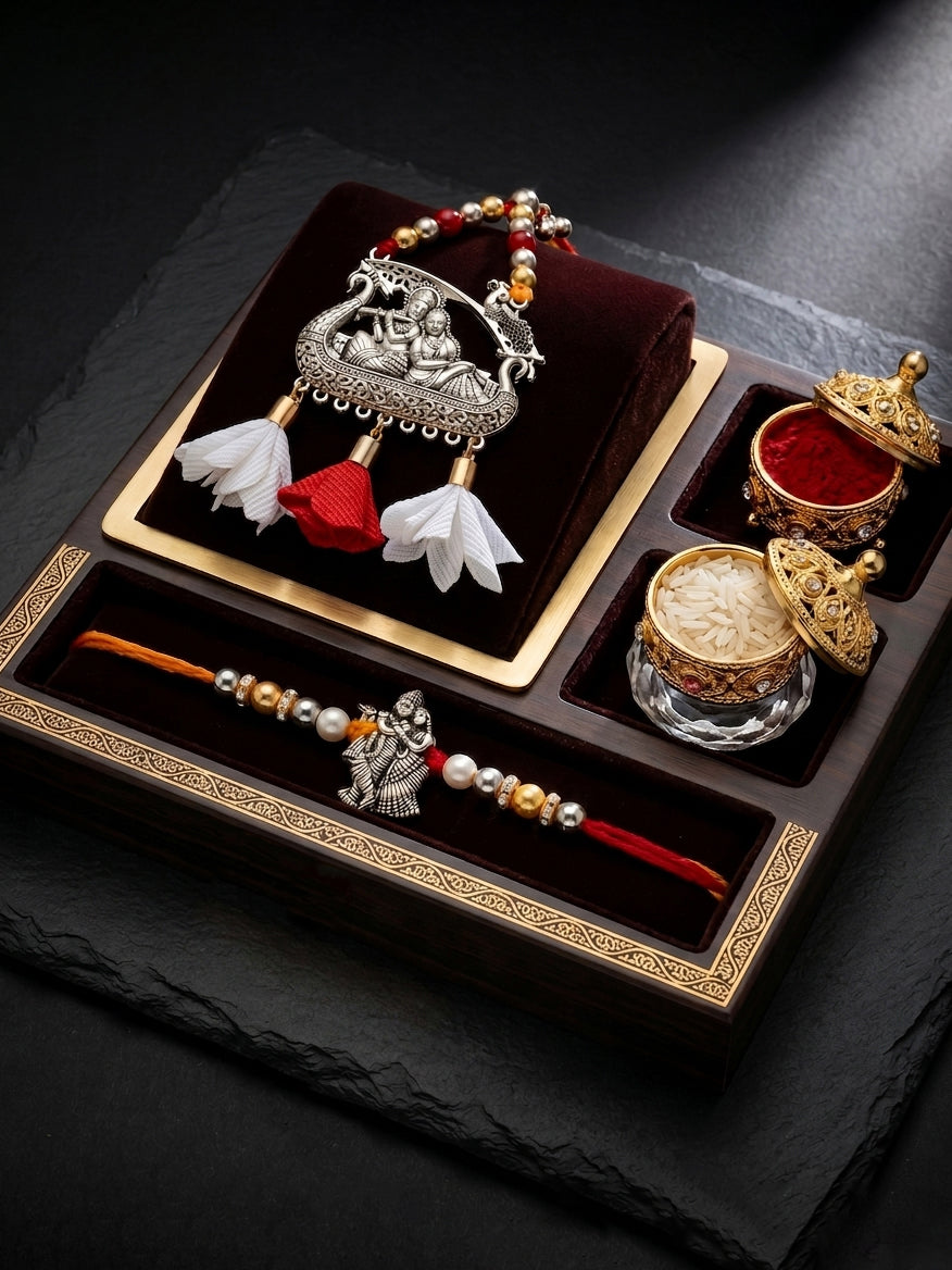 Set of 2 Bhaiya Bhabhi Rakhi Set with Radha Krishna Pendant, Maroon & White Tassels, Roli Chawal (182-JPCR1-1990-S-2-2026)