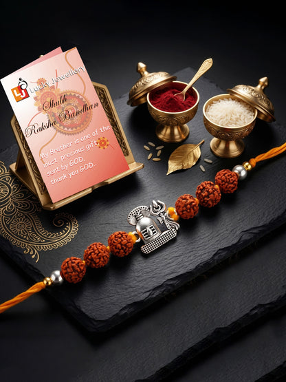 Silver Spiritual Shivling Trishul Rakhi for Brother with Rudraksha, Roli & Chawal & Card (73-CHR1-1963-1-2026)