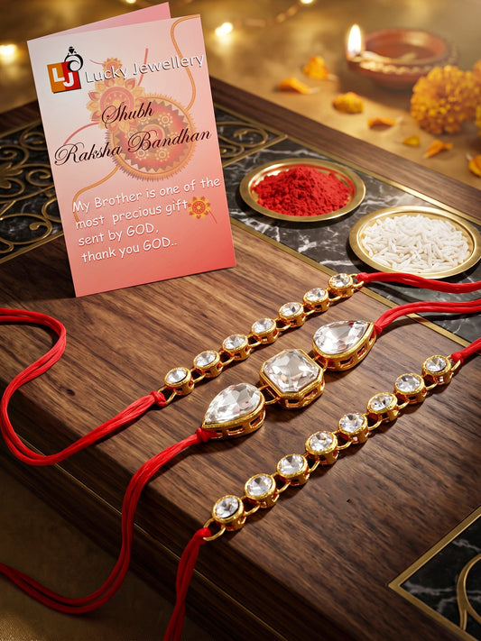 LUCKY JEWELLERY Traditional Rakhi for Brother/Bhaiya – Gold Plated Red Thread Rakshabandhan Rakhie White Stones for Bhai/Bhabhi (Pack of 3) – Fancy Rakhee Bracelet Rakshasutra (159-L1R1-08-W-3-2026)