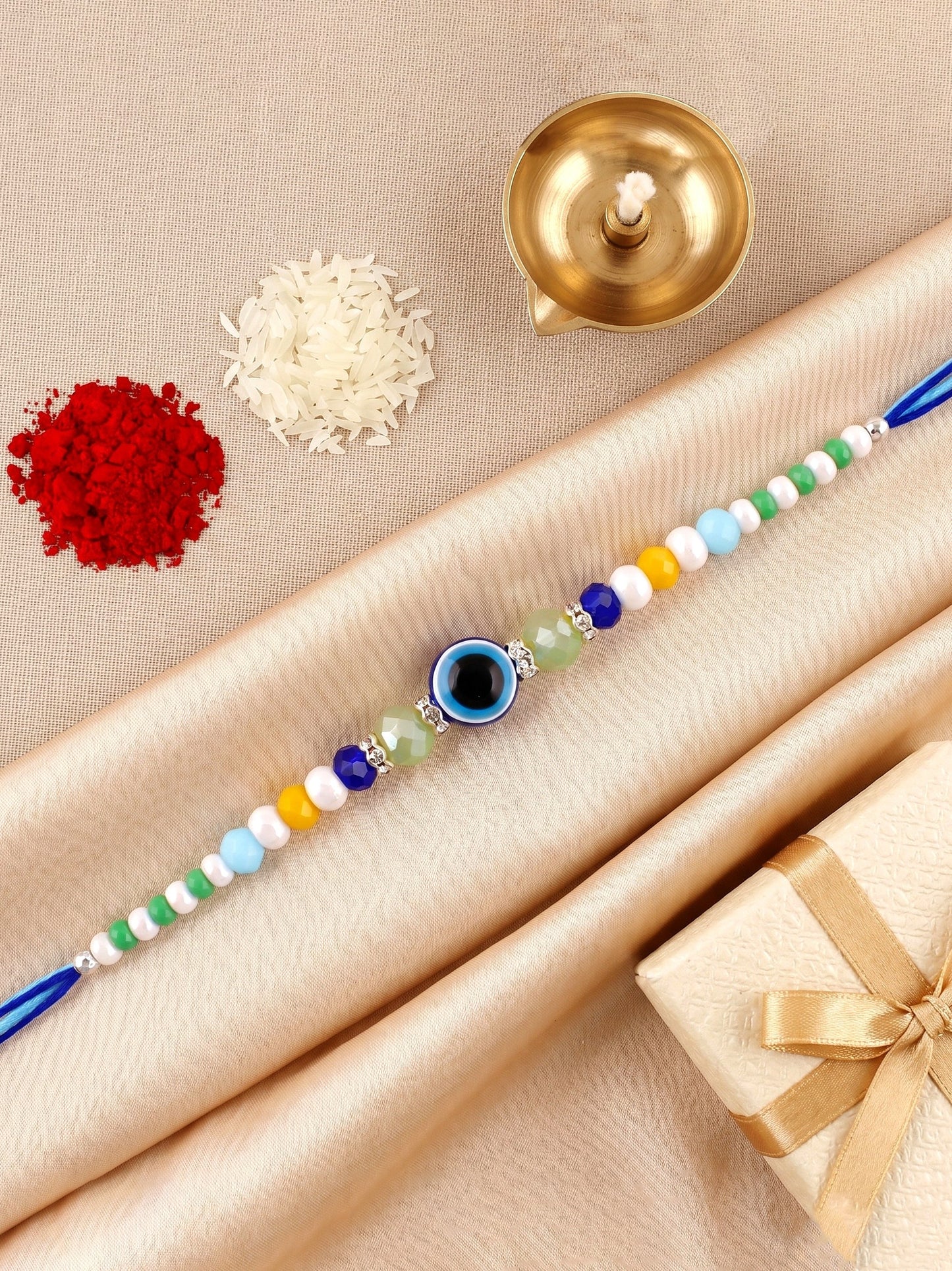 Blue Evil Eye Rakhi with Greeting Card and Roli Chawal Set for Rakshabandhan (57-S5R1-RN2244)