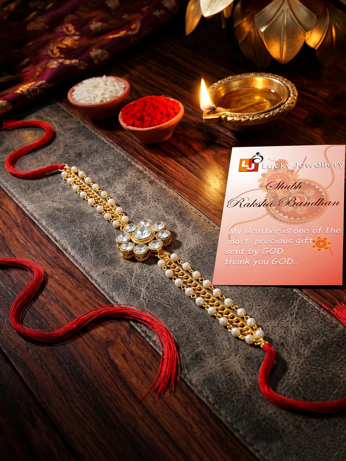 LUCKY JEWELLERY Traditional Rakhi for Brother/Bhaiya – Gold Plated Red Thread Rakshabandhan Rakhie in White Stones for Bhai/Bhabhi (Pack of 1) – Fancy Rakhee Bracelet Rakshasutra (99-L1R1-26-W-1-2026)
