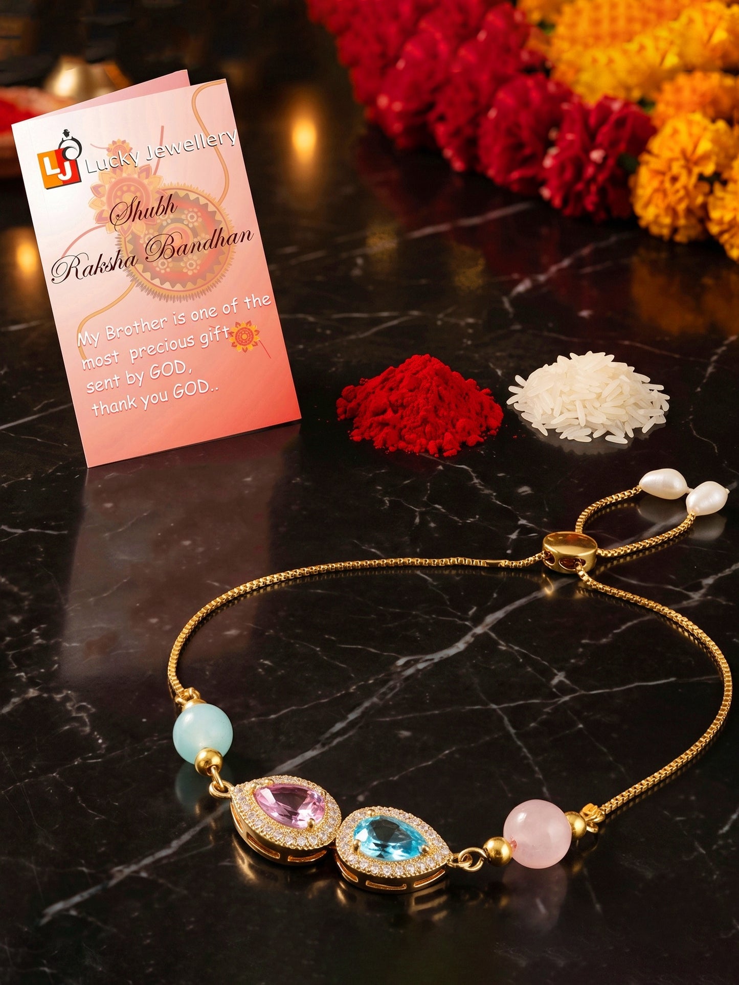 Adjustable Rakhi Bracelet with Blue & Pink drop AD Pendant,Pastel Beads,Roli Chawal & Card (209-CHB2-1279-PKF-2026)