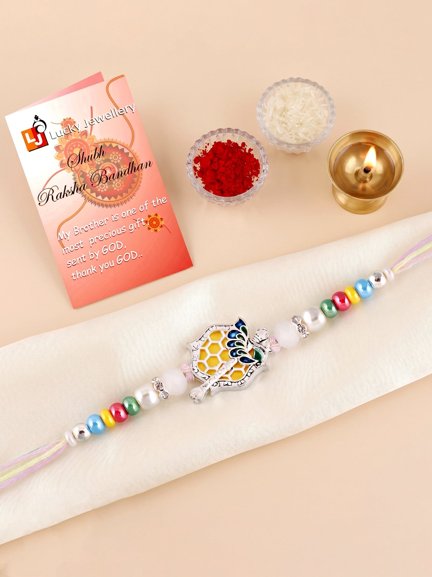 Silver-Finish Krishna Flute Bansuri Mor Pankh Beaded Rakhi Set For Brother | Roli Chawal, Card (132-S5R1-AR2770)