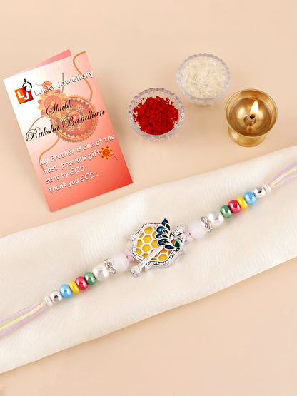 Silver-Finish Krishna Flute Bansuri Mor Pankh Beaded Rakhi Set For Brother | Roli Chawal, Card (132-S5R1-AR2770)