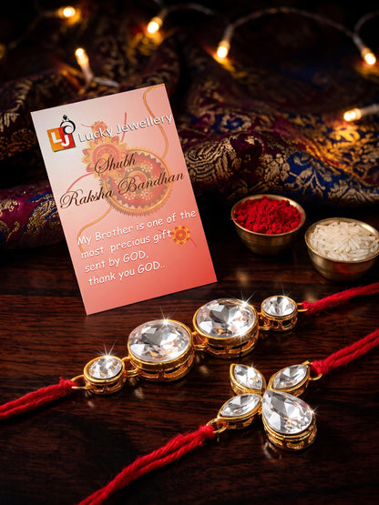 LUCKY JEWELLERY Traditional Rakhi for Brother/Bhaiya – Gold Plated Red Thread Rakshabandhan Rakhie in White Stones for Bhai/Bhabhi (Pack of 2) – Fancy Rakhee Rakshasutra (152-L1R1-06-10-W-2-2026)