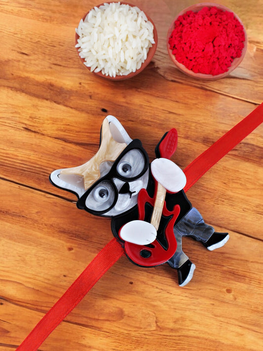 Lucky Jewellery Trendy Fashion Plastic Guitar Cat With Glasses Kids Rakhi - Rakshabandhan Rakhee Bracelet for Kids Brother Bhaiya Bhai Bhabhi - Pack of 1 (440-CHR1-1192-1)