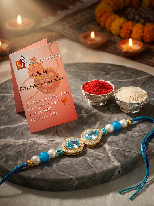 Rakhi for Brother with Blue drop AD Pendant, Smooth White Beads, Roli Chawal & Card (176-CHR1-1279-FB-1-2026)