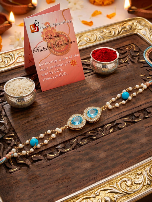 Adjustable Rakhi Bracelet with Blue drop AD Pendant, Turquoise & White Beads on Double Chain (200-CHB2-1279-F-2026)