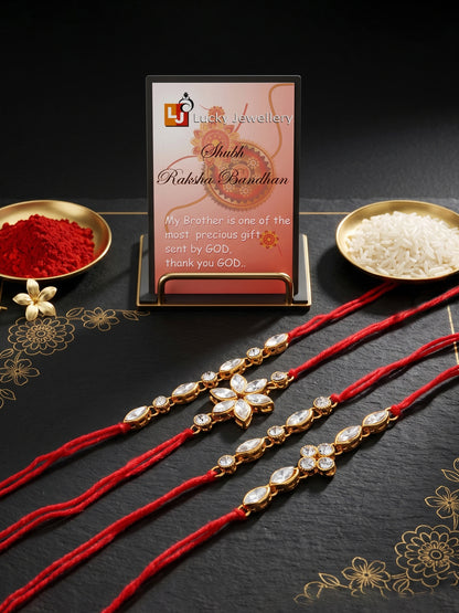 LUCKY JEWELLERY Traditional Rakhi for Brother/Bhaiya – Gold Plated Red Thread Rakshabandhan Rakhie White Stones for Bhai/Bhabhi (Pack of 4) – Fancy Rakhee Bracelet Rakshasutra (149-L1R1-11-W-4-2026)