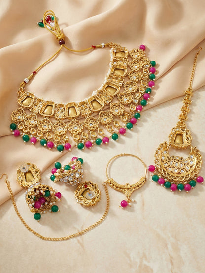 18 KT Gold Plated Magenta Green Kundan Bridal & Semi-Bridal Necklace Set with Earrings, Maang Tikka & Nath (2476-M8SK-1101-RG)