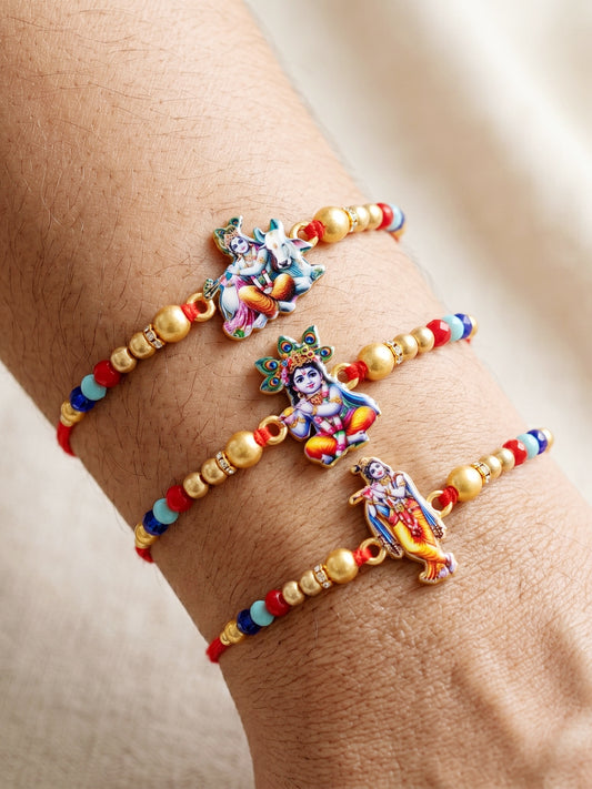 Designer Krishna Rakhi Set of 3 for Bhai | Traditional Red Thread with Golden & Colored Beads | Raksha Bandhan Gift Pack with Roli Chawal Card (252-S5R1-2310-3)