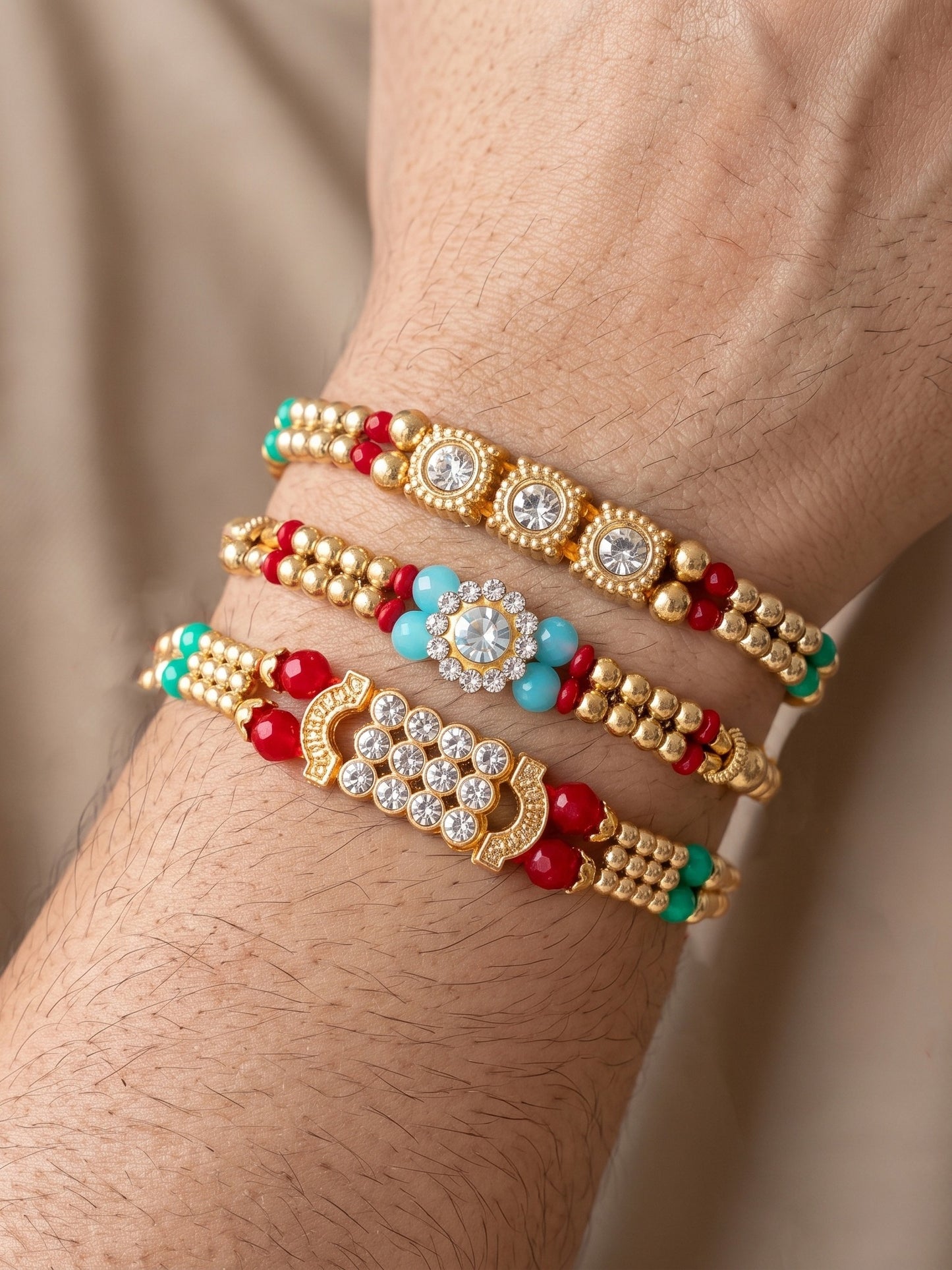Lucky Jewellery Set of 3 Rakhi with Small Crystal Centerpieces, Gold-Tone & Colored Beads, Roli Chawal & Card (48-S7R1-2312-3)