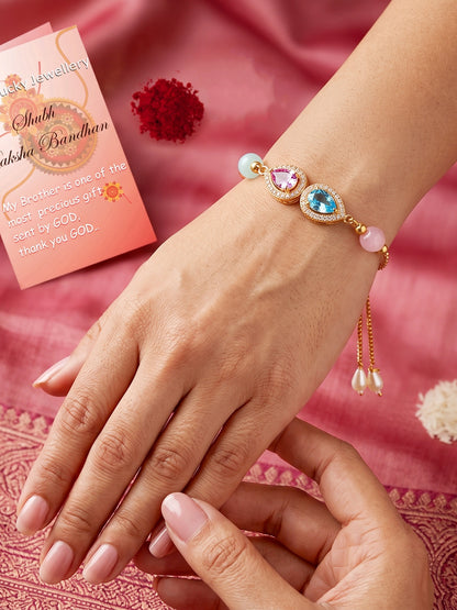 Adjustable Rakhi Bracelet with Blue & Pink drop AD Pendant,Pastel Beads,Roli Chawal & Card (209-CHB2-1279-PKF-2026)