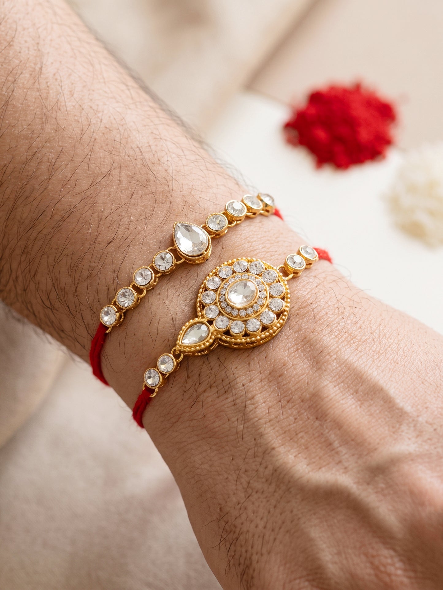 LUCKY JEWELLERY Traditional Rakhi for Brother/Bhaiya – Gold Plated Red Thread Rakshabandhan Rakhie White Stones for Bhai/Bhabhi (Pack of 2) – Fancy Rakhee Bracelet Rakshasutra (159-L1R1-21-W-2-2026)