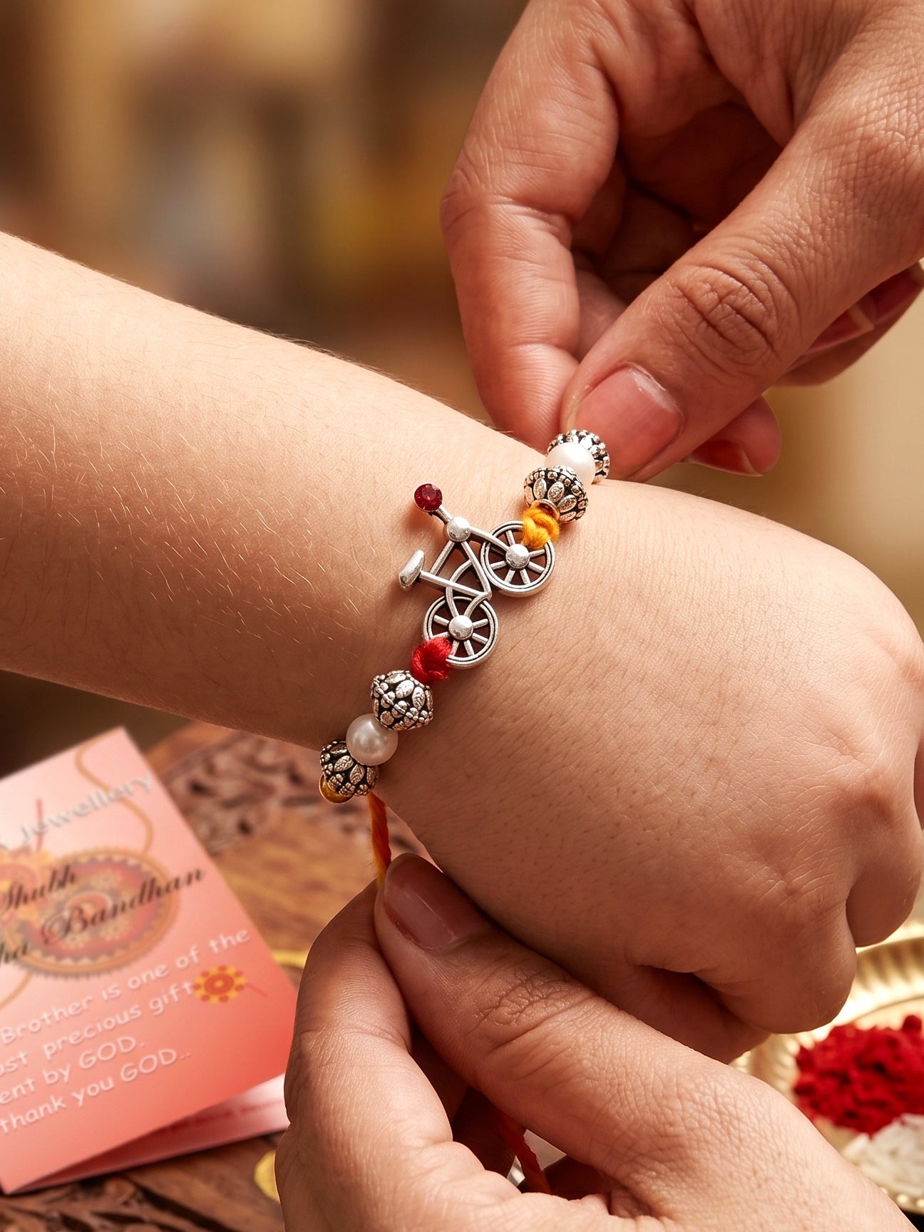 Set of 2 Silver Bicycle Rakhi for Brother with White & Metallic Beads, Roli Chawal & Card (72-JPR1-1954-S-2-2026)