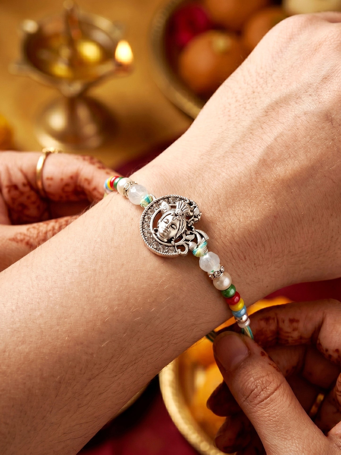 Silver-Tone Bal Gopal Krishna Rakhi for Brother | Beaded Rakhi Set With Roli Chawal & Greeting Card (102-S5R1-AR3007)