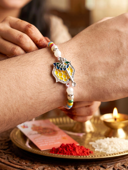 Silver-Finish Krishna Flute Bansuri Mor Pankh Beaded Rakhi Set For Brother | Roli Chawal, Card (132-S5R1-AR2770)