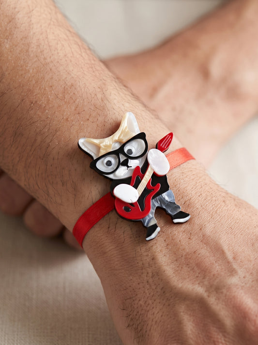 Kids Rakhi: Cute Rockstar Cat Playing Guitar Acrylic Charm on Red Ribbon, Roli, Chawal & Card (440-CHR1-1192-1-2026)