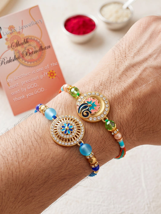 Lucky Jewellery Set of 2 Rakhi with Peacock & Floral Pendants, Blue & Green Beads, Roli Chawal & Card (173-S7R1-2317-2)