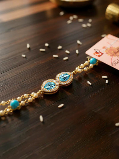 Lucky Jewellery Designer Turquoise Color Stone Rakhi - Rakshabandhan Rakhee Bracelet Pearl Lumba for Bhabhi/Girls & Women with Pull Chain Pack of 1 (233-CHB2-1279-F)