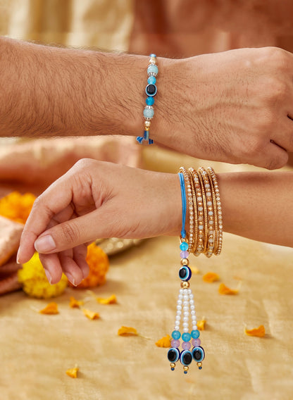 Set of 2 Bhaiya Bhabhi Evil Eye Rakhi Set with Blue & White Beads, Lumba Tassel, Roli Chawal & Card (75-J5R1-1993-EE-2-2026)