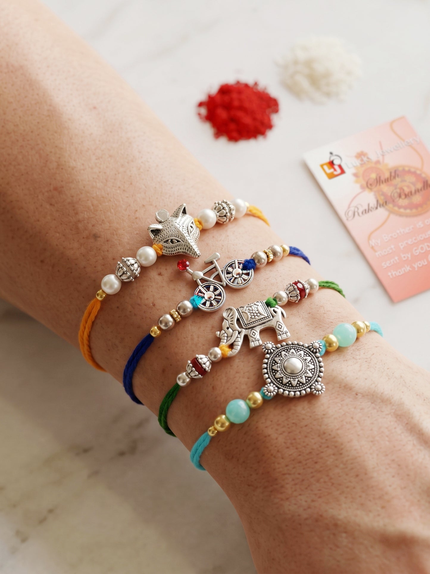 Set of 4 Animal & Cycle Rakhi for Kids with Multi & White Beads, Roli Chawal & Card (122-JPR1-1983-S-4-2026)