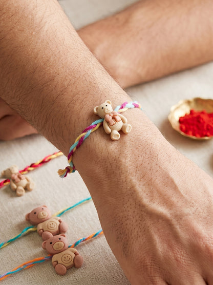 Set of 4 Small Teddy Bear Pendant Rakhi for Kids with Colorful Braided Thread, Roli Chawal & Card (130-CHR1-1948-4-2026)