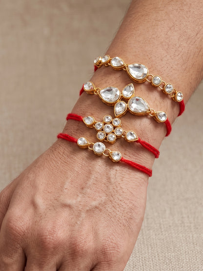 LUCKY JEWELLERY Traditional Rakhi for Brother/Bhaiya – Gold Plated Red Thread Rakshabandhan Rakhie White Stones for Bhai/Bhabhi (Pack of 4) – Fancy Rakhee Bracelet Rakshasutra (159-L1R1-02-W-4-2026)