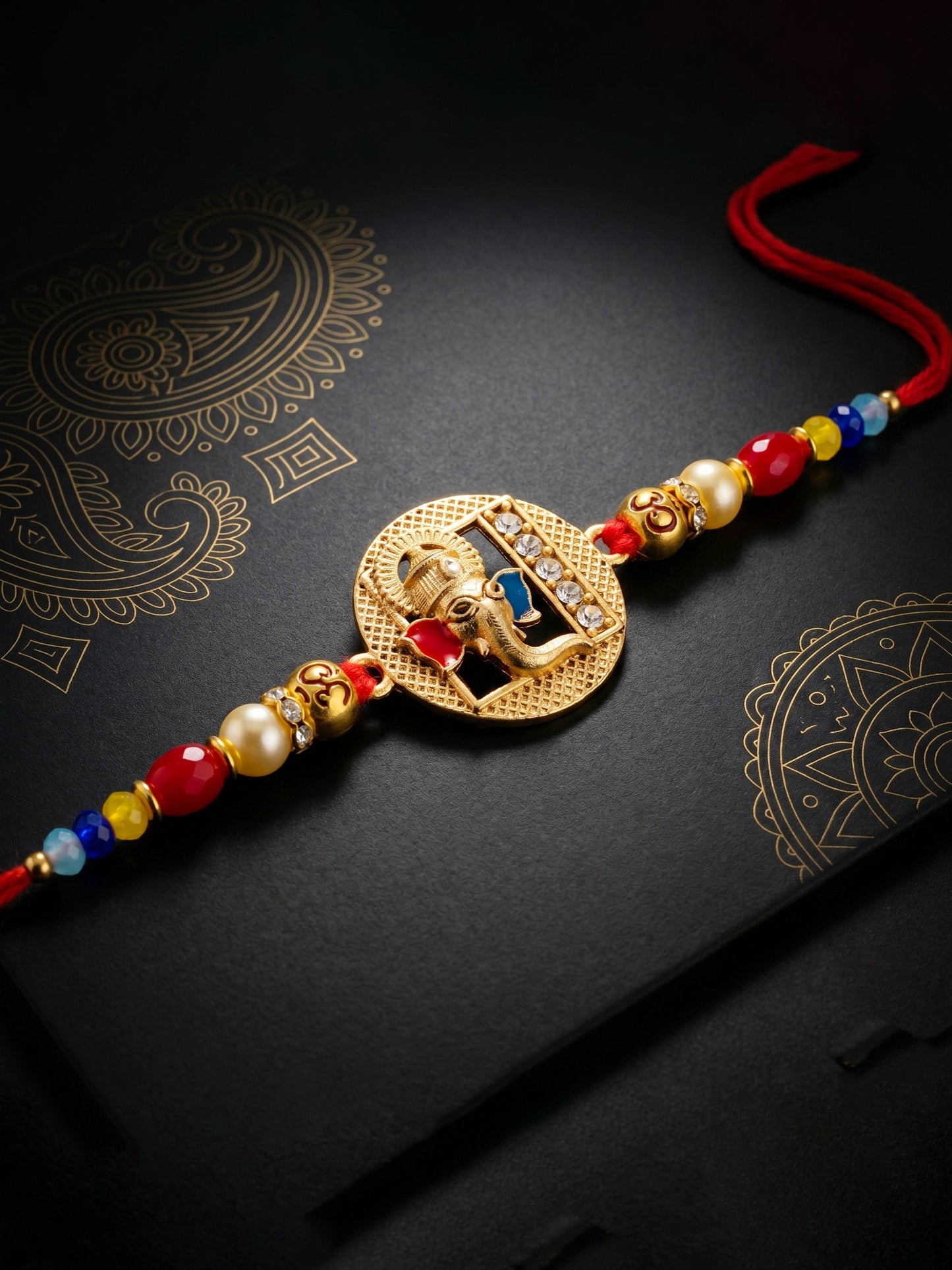 Divine Lord Ganesha & Spiritual Om Beaded Rakhi Set For Brother | With Roli Chawal & Greeting Cards (72-S5R1-AR2922)