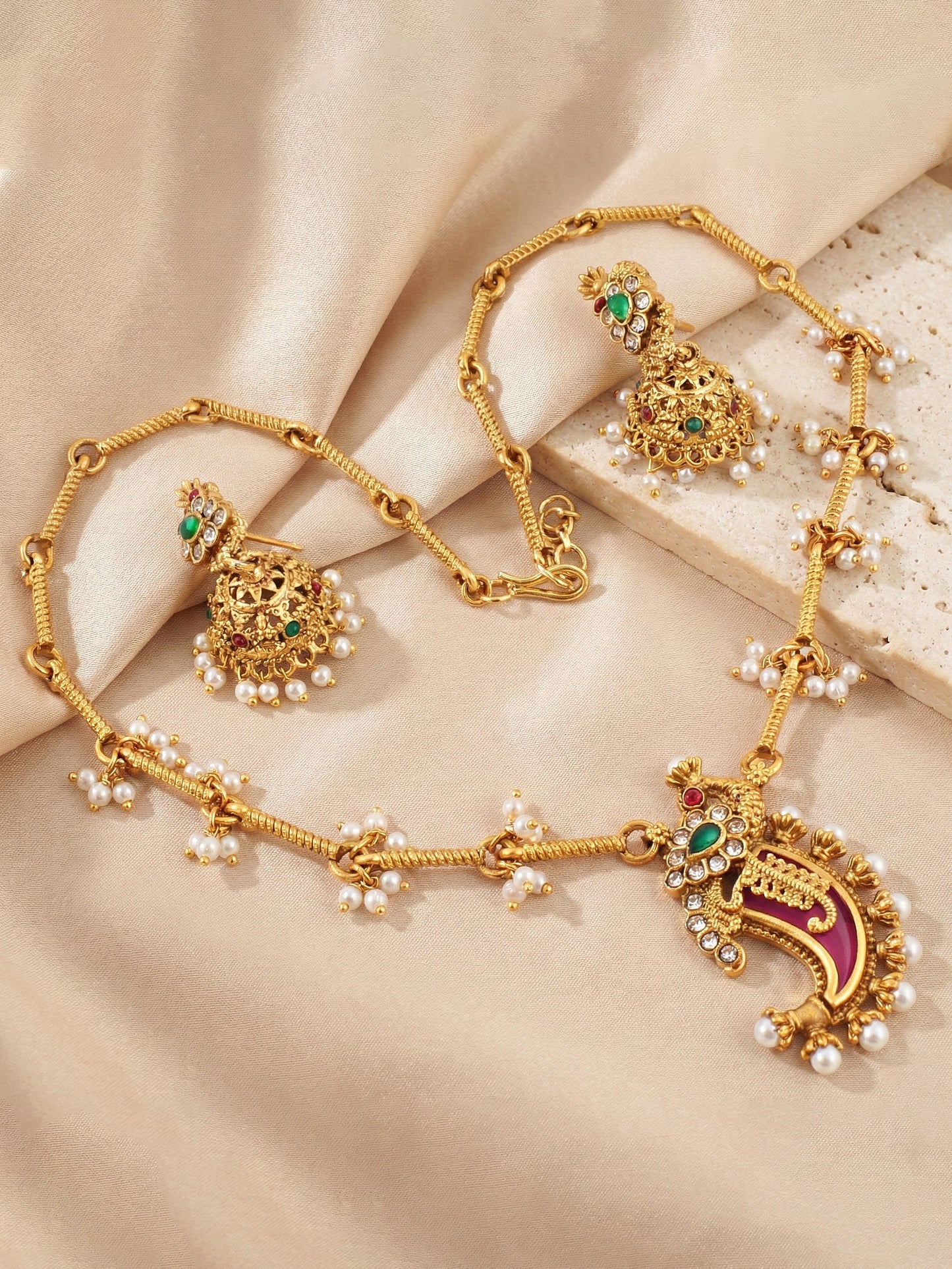 Traditional Gold-Tone Paisley Pendant Necklace Set with Dome Jhumka Earrings | Pink Enamel Meenakari Detailing & Green Stone Embellishments (689-ISR-2182-RG)
