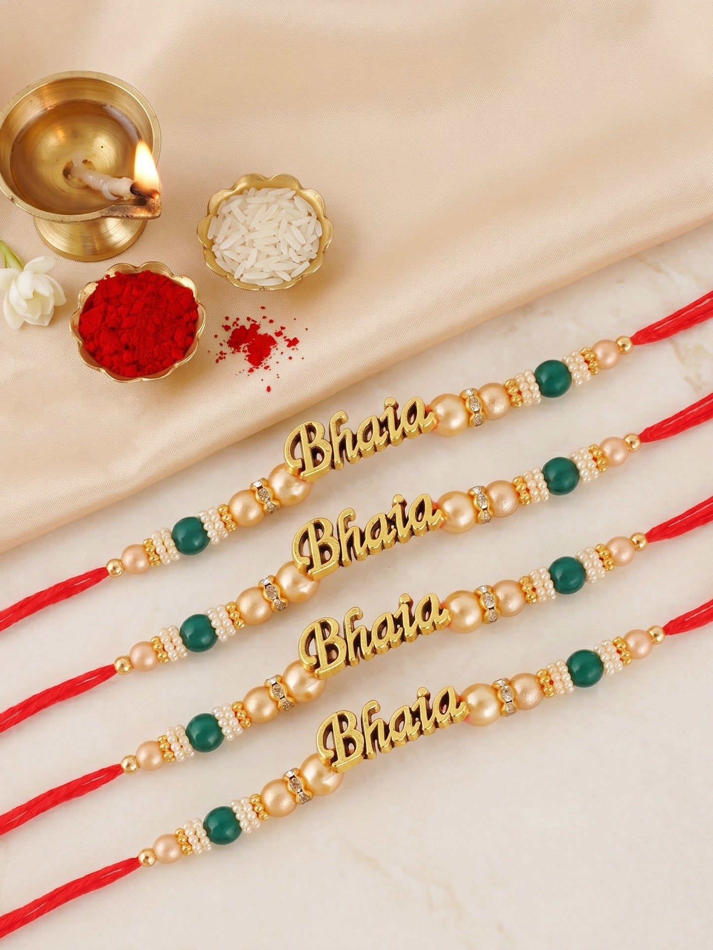 Set of 4 Gold Bhaia Rakhi for Brothers with Green & Beads, Roli Chawal & Card (94-CHR1-1965-4-2026)