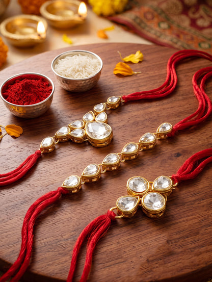 LUCKY JEWELLERY Traditional Rakhi for Brother/Bhaiya – Gold Plated Red Thread Rakshabandhan Rakhie White Stones for Bhai/Bhabhi (Pack of 3) – Fancy Rakhee Bracelet Rakshasutra (159-L1R1-04-W-3-2026)