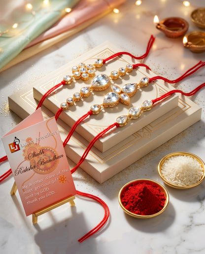 LUCKY JEWELLERY Traditional Rakhi for Brother/Bhaiya – Gold Plated Red Thread Rakshabandhan Rakhie White Stones for Bhai/Bhabhi (Pack of 4) – Fancy Rakhee Bracelet Rakshasutra (159-L1R1-02-W-4-2026)