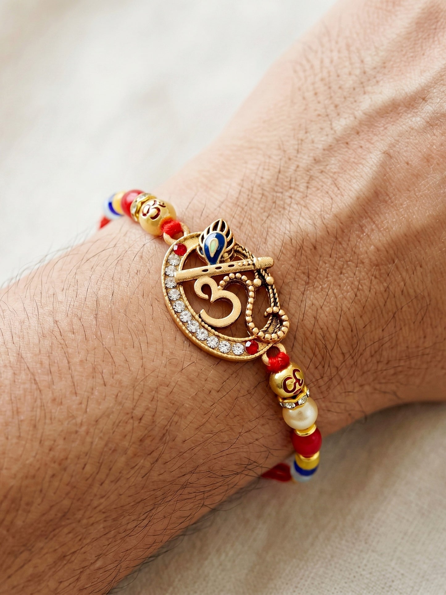 Spiritual Om Krishna Flute Peacock Beaded Rakhi Set For Brother | Roli Chawal & Cards (72-S5R1-AR2927)