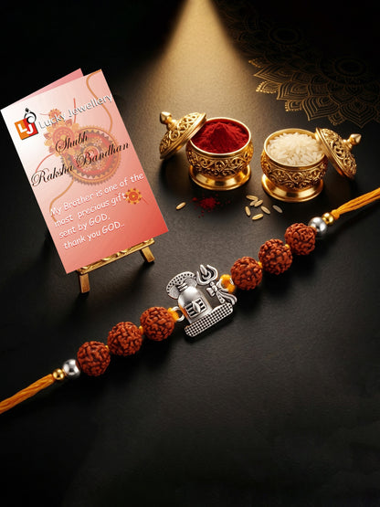 Silver Spiritual Shivling Trishul Rakhi for Brother with Rudraksha, Roli & Chawal & Card (73-CHR1-1963-1-2026)