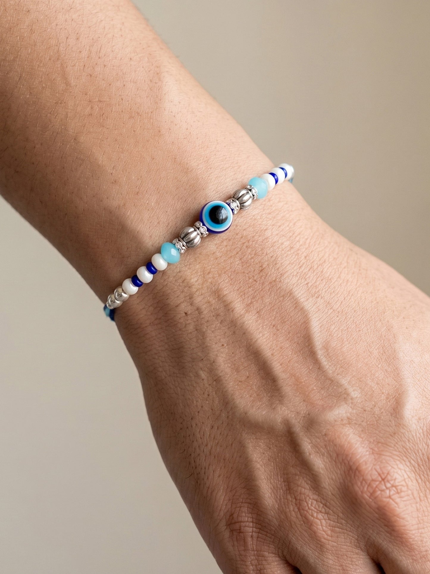 Blue Evil Eye Rakhi with Greeting Card and Roli Chawal Set for Rakshabandhan (54-S5R1-RN2239)