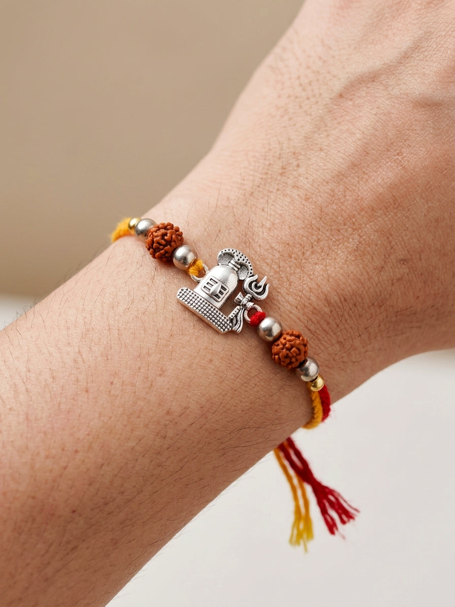 Set of 2 Silver Shivling Trishul Rakhi for Brother with Rudraksha, Roli & Chawal & Card (72-JPR1-1963-S-2-2026)