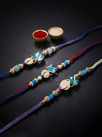Designer Rakhi Set of 3: Blue Crystal, Cream Stone, Metallic Spacers, Roli, Chawal & Card (300-CHR1-1002A-3-2026)