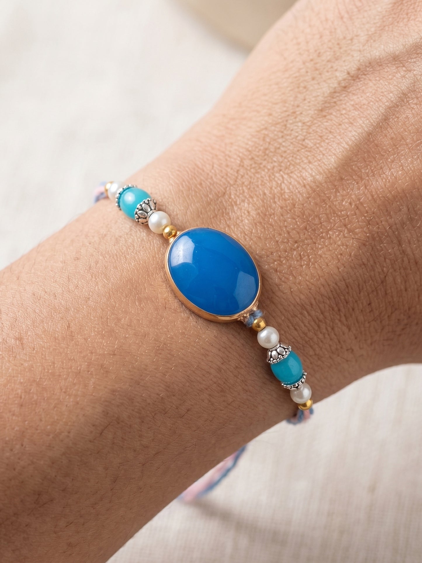 Set of 2 Blue Faux Stone Bhaiya Bhabhi Rakhi Set with Jhumki Lumba, Blue & White Beads (265-CHCR1-1151-FB-2-2026)