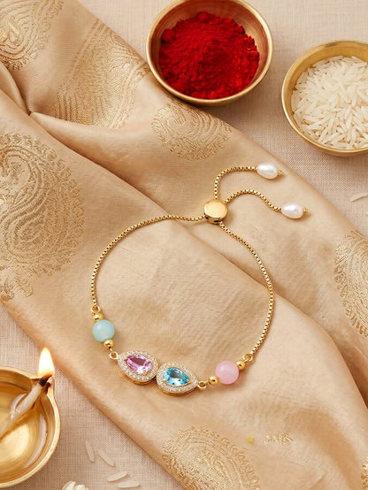 Adjustable Rakhi Bracelet with Blue & Pink drop AD Pendant,Pastel Beads,Roli Chawal & Card (209-CHB2-1279-PKF-2026)