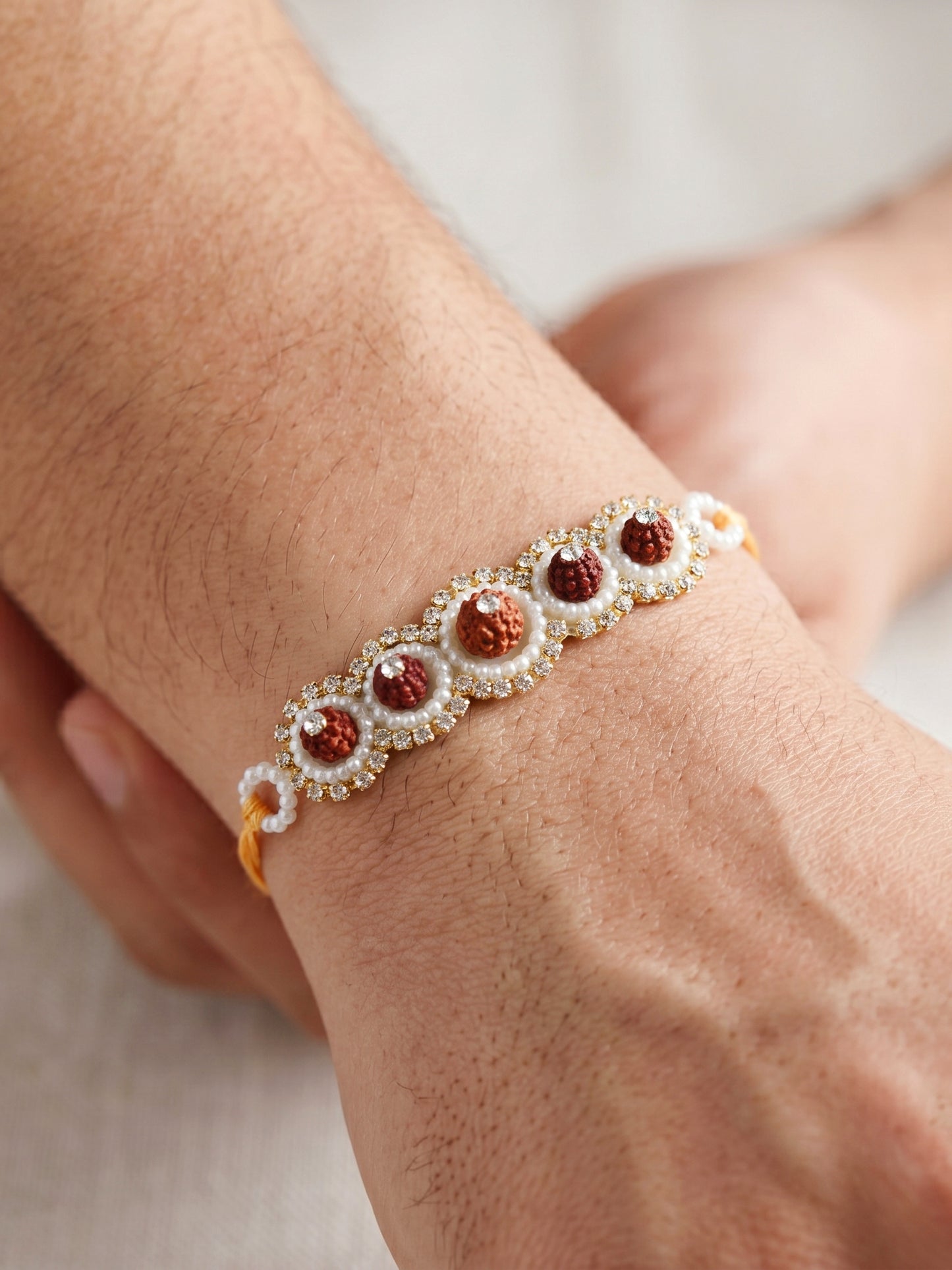 Designer Bhaiya Bhabhi Rakhi Set | Peach Floral Dangling Lumba & Traditional Brown Beaded Rakhi (192-S7R1-PJ6605-PH)