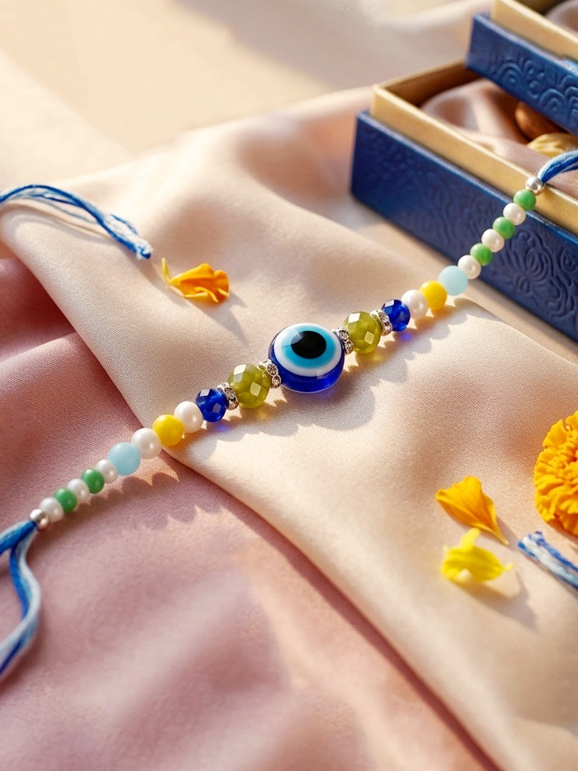 Blue Evil Eye Rakhi with Greeting Card and Roli Chawal Set for Rakshabandhan (57-S5R1-RN2244)