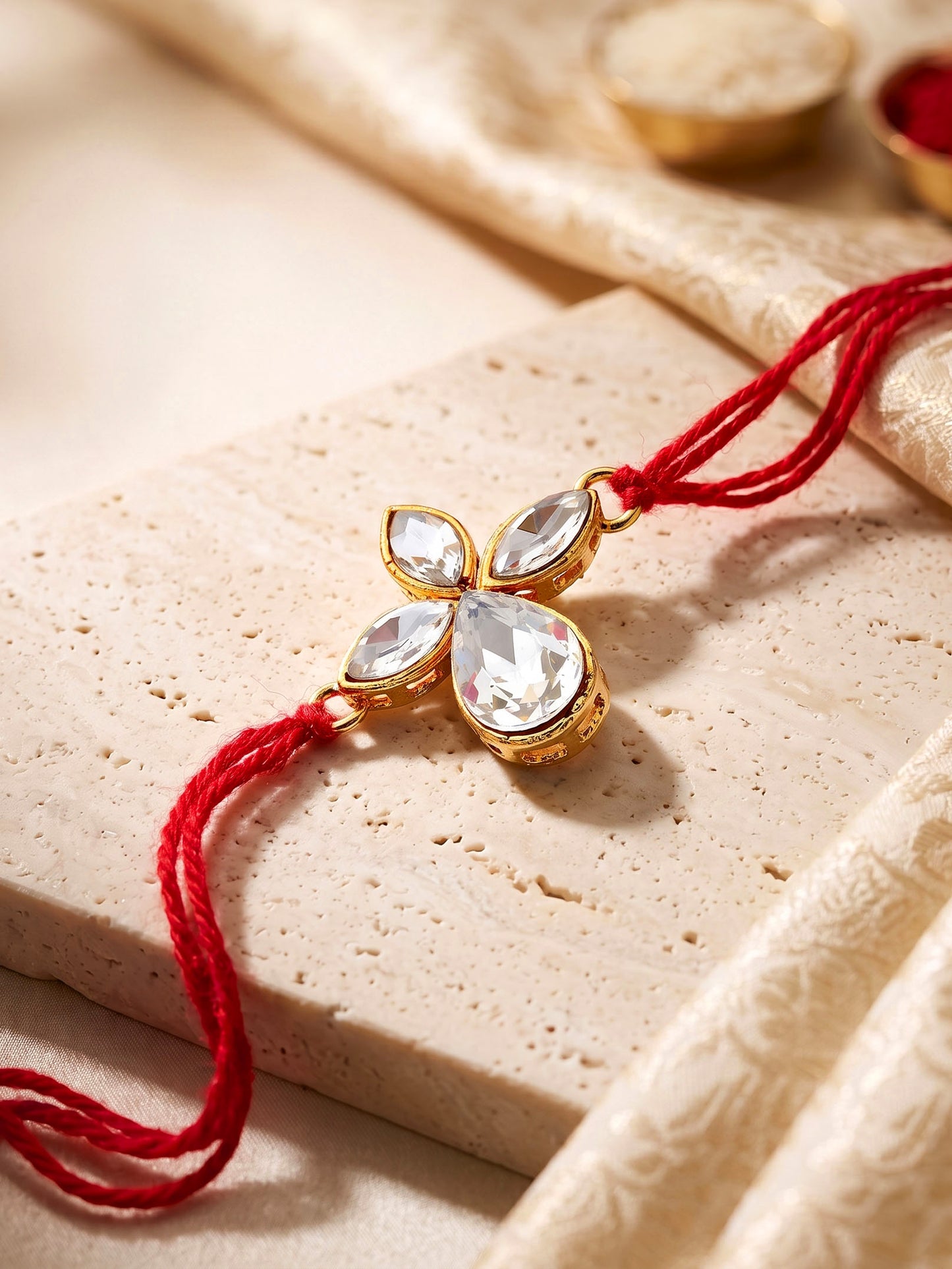 LUCKY JEWELLERY Traditional Rakhi for Brother/Bhaiya – Gold Plated Red Thread Rakshabandhan Rakhie in White Stones for Bhai/Bhabhi (Pack of 1) – Fancy Rakhee Bracelet Rakshasutra (76-L1R1-06-W-1-2026)