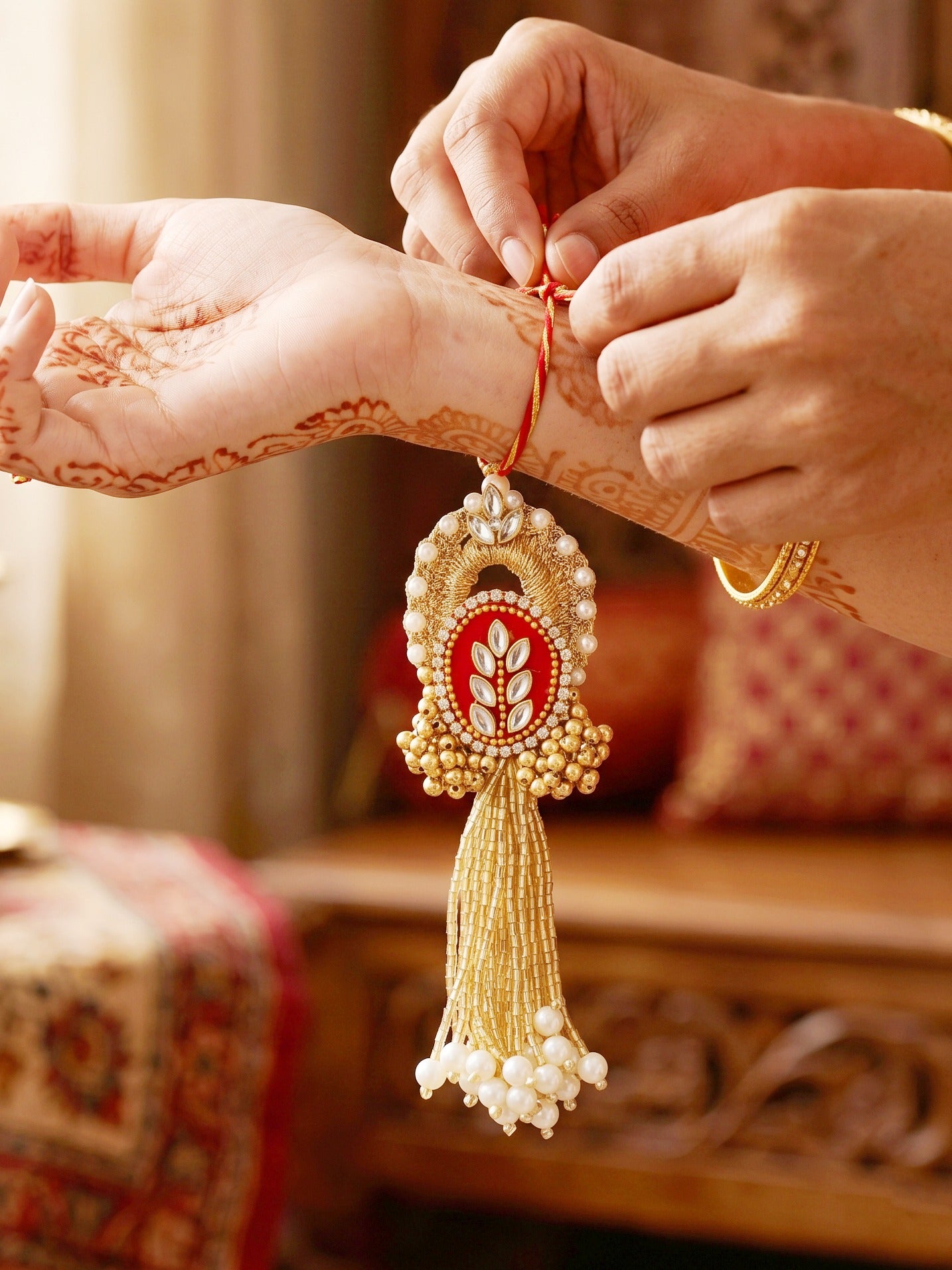 Designer Red Kundan Bhaiya Bhabhi Rakhi Set | Gold Lumba Tassel & White Beaded Matching Rakhi (216-S7R1-PJ7001-M)