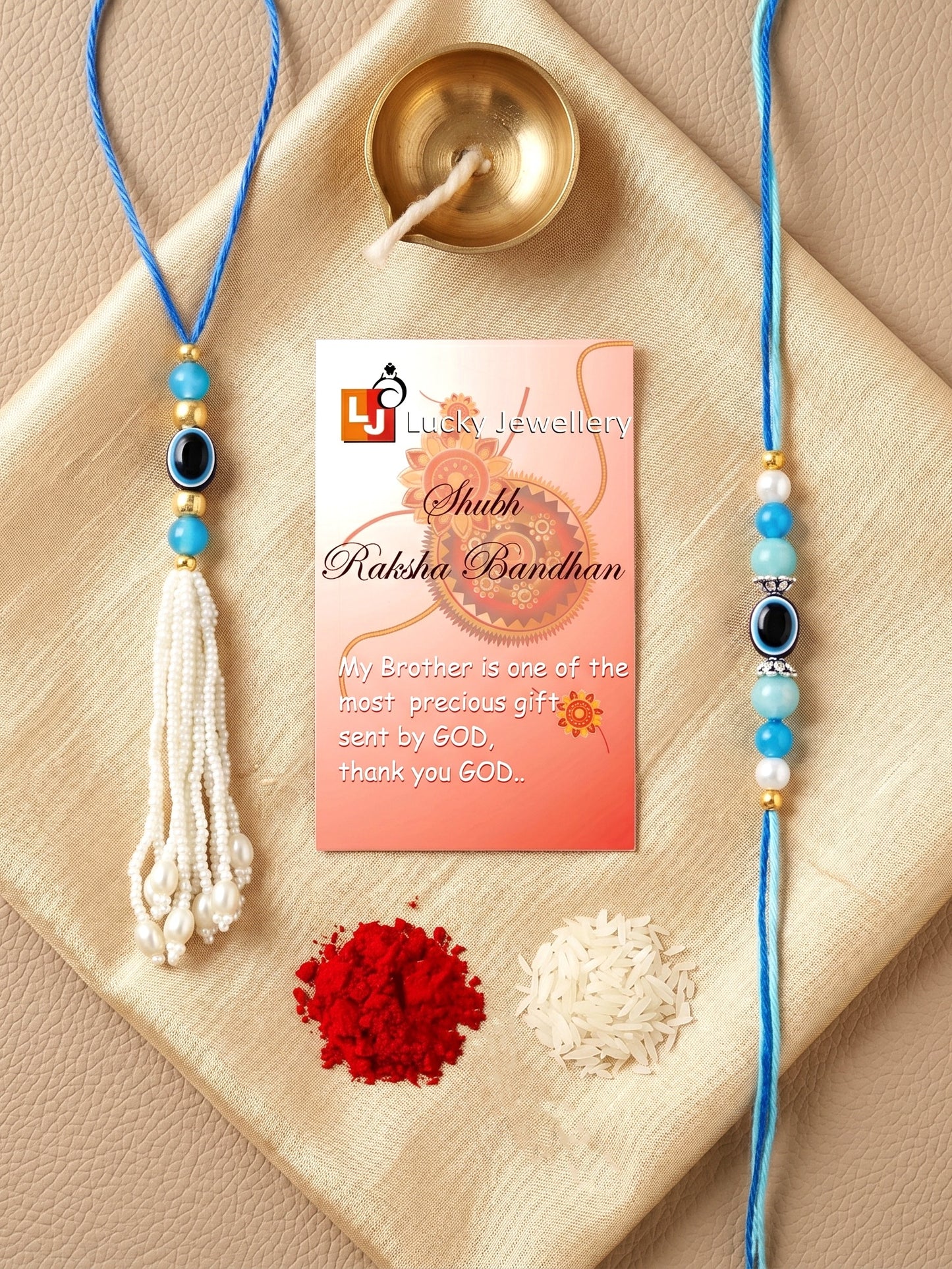Set of 2 Bhaiya Bhabhi Evil Eye Rakhi Set with Blue & White Beads, Lumba Tassel, Roli Chawal & Card (72-J5R1-1992-EE-2-2026)
