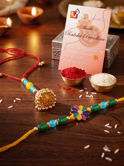 Set of 2 Bhaiya Bhabhi Rakhi Set with Floral Centerpiece & Jhumka Lumba, Roli Chawal & Card (240-CHCR1-1146-MT-2-2026)