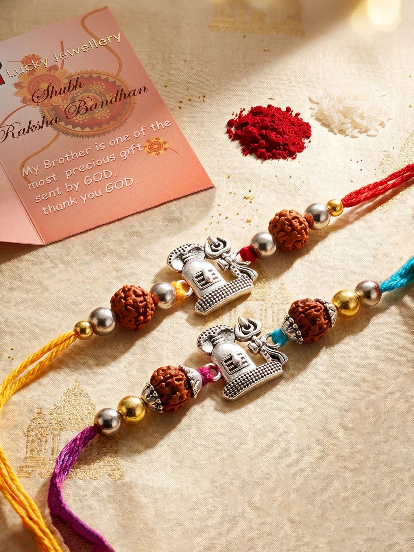 Set of 2 Silver Shivling Trishul Rakhi for Brother with Rudraksha, Roli & Chawal & Card (72-JPR1-1963-S-2-2026)